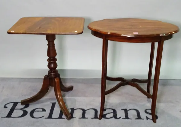 An Edwardian inlaid mahogany oval side table united by an X- frame stretcher, 67cm wide x 71cm high, and a 19th century mahogany tripod table with rec