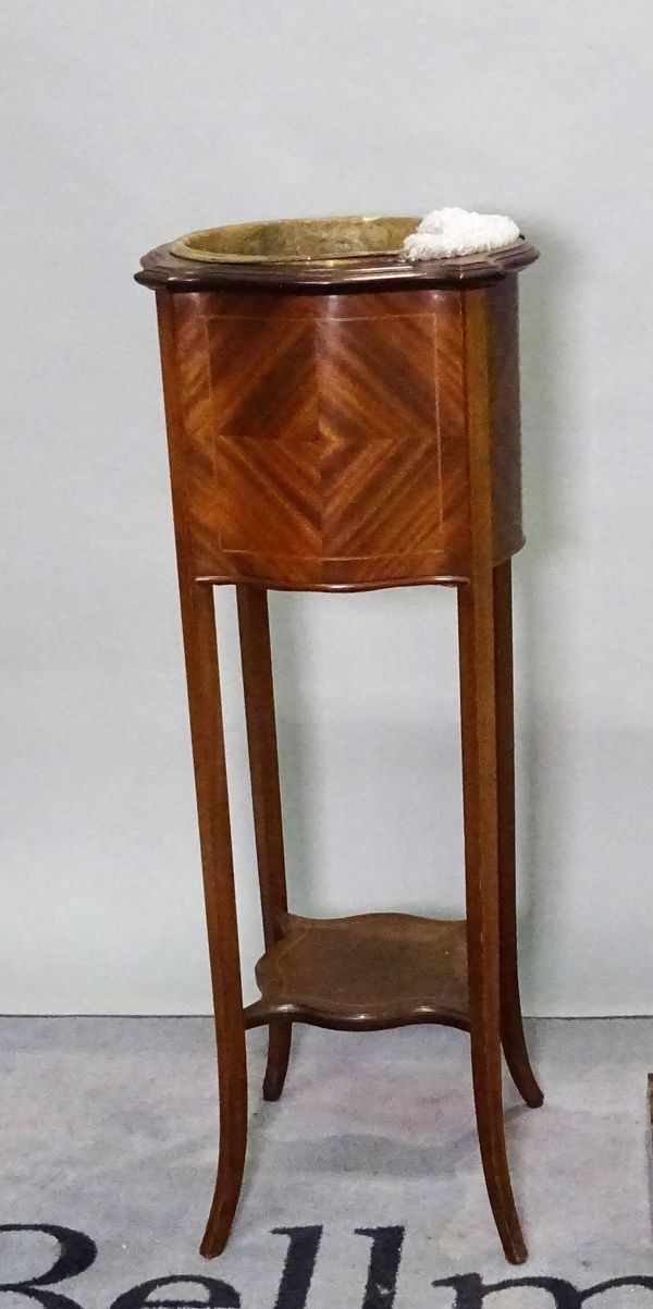 A late Edwardian mahogany and satinwood banded jardiniere on outswept supports, 41cm wide x 98cm high.