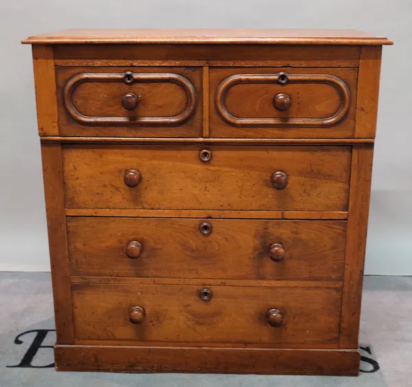 A mahogany chest of drawers, with two small over three long drawers with moulded decoration to the top two drawers and escutcheons, 103cm wide x 109cm