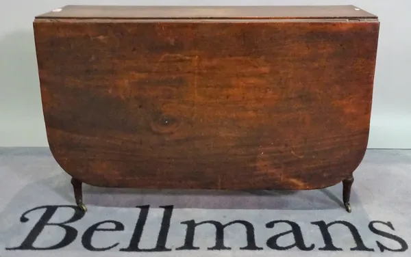 A late Victorian mahogany drop flap dining table on turned supports, 106cm wide x 70 cm high.