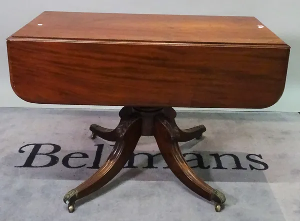 A late Victorian mahogany single drawer drop flap centre table, 107cm wide x 74cm high.