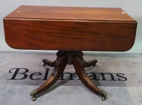 A late Victorian mahogany single drawer drop flap centre table, 107cm wide x 74cm high.