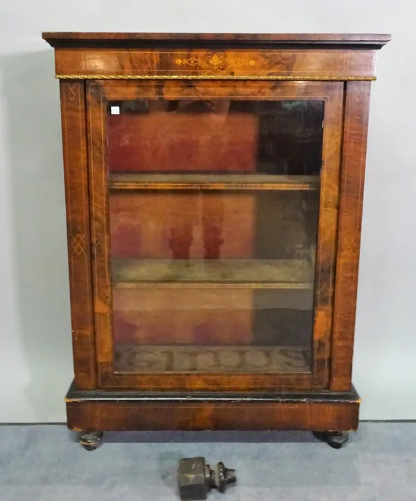 A late Victorian walnut pier cabinet, 80cm wide x 105cm high, (a.f.).