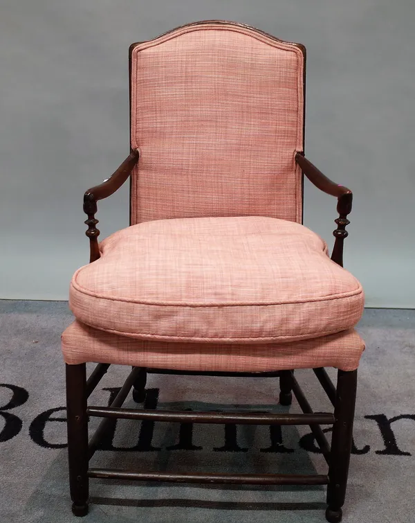 A 19th century and later stained pine child's open armchair with pink upholstery, 48cm wide x 86cm high.