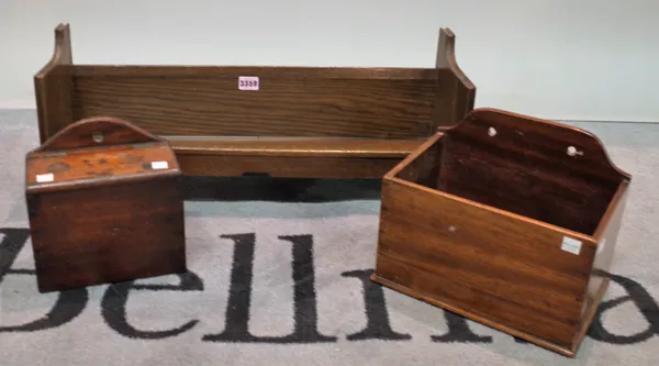 An early 20th century oak book shelf, 64cm wide x 24cm high, and a 19th century mahogany wall hanging box, 26cm wide x 20cm high, and another similar,