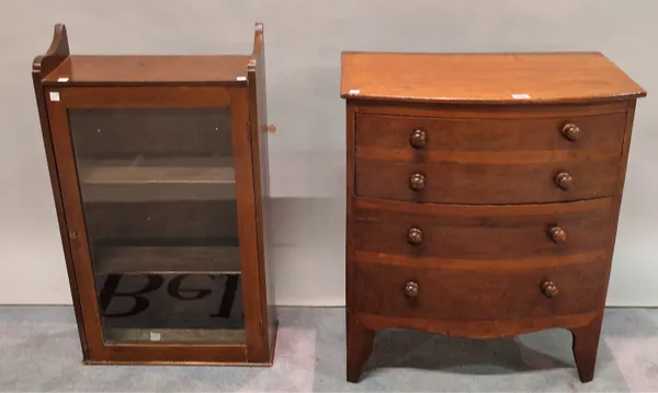 A 19th century mahogany single drawer bowfront chest, 60cm wide x 70cm high, and a 20th century mahogany hanging display cabinet, 39cm wide x 70cm hig