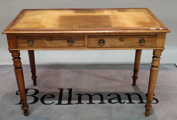 A Victorian mahogany writing table with tooled leather top and two frieze drawers on turned supports, 108cm wide.