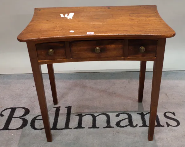 A 19th century mahogany concave side table with three frieze drawers on tapering square supports, 75cm wide x 73cm high.