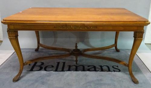 An early 20th century French stained beech extending dining table on downswept supports united by an X-frame stretcher, 153cm wide x 79cm high. (290cm