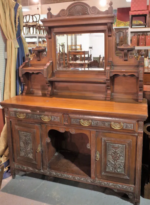 A late Victorian mahogany sideboard with mirrored back over two drawer cupboard base, 150cm wide x 210 cm high.