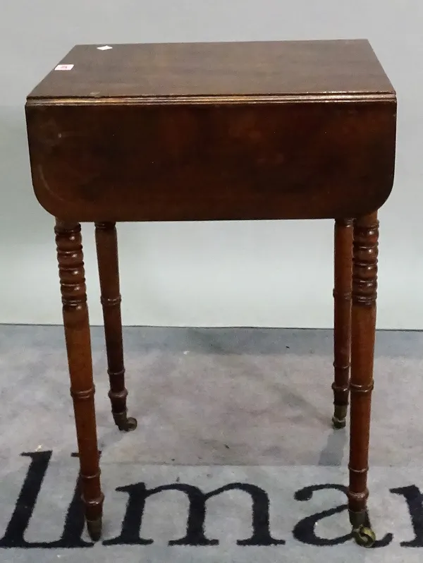 A Regency mahogany drop flap work table with single frieze drawer on turned supports, 46cm wide x 69cm high.