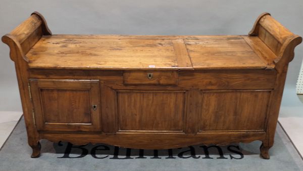 An 18th century single oak window seat with a single drawer over a cupboard base, 175cm wide x 86cm high.