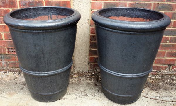 A pair of  terracotta plant pots of tapering form, 56cm diameter x 70cm high, (2).