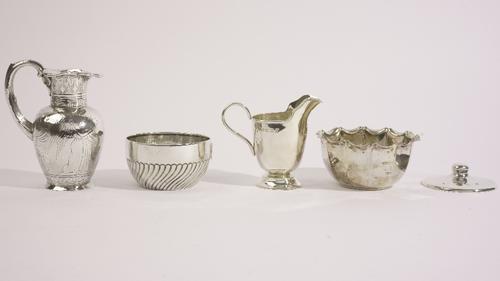 Silver, comprising; a Victorian milk jug, of classical form, decorated with figures after antiquity beneath a Greek key pattern border, Sheffield 1844