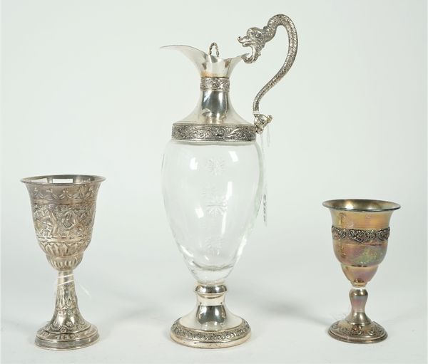 A pedestal goblet, detailed indistinctly 925, another pedestal goblet, detailed 925 and an Italian plated metal mounted glass liqueur jug, (3).