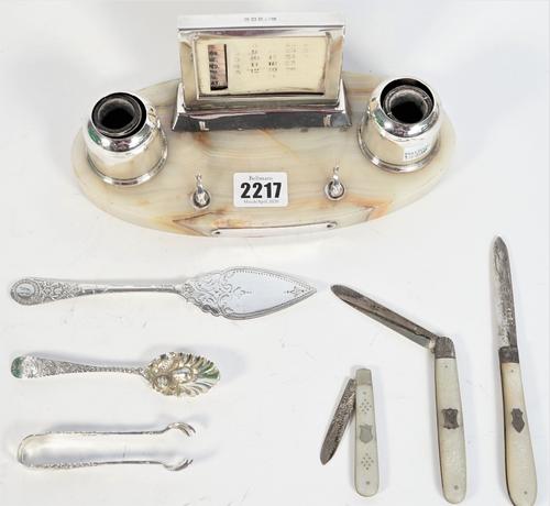 Silver and silver mounted wares, comprising; a twin bottle pen and ink desk stand, with a central calendar frame, raised on an oval base, Birmingham 1