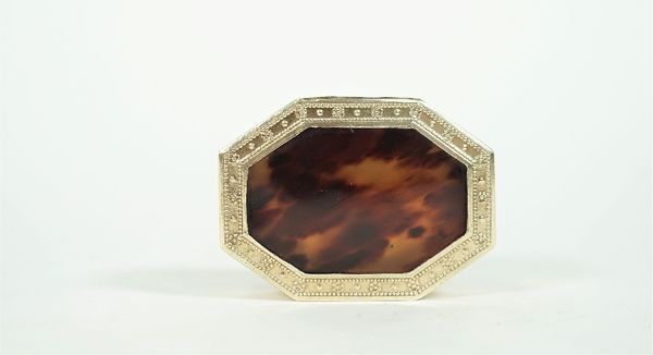 A French silver gilt and tortoiseshell box, of octagonal form, the hinged cover inset with a shell panel within a foliate beaded border, by Henin & Ci