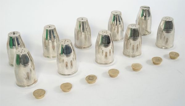 A set of five silver salts and a set of five silver matching pepperettes, nine pieces London 2001 and one salt, London 2000, plastic and rubber loaded