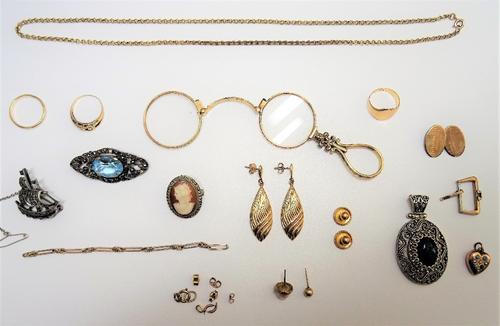 A group of mostly 9ct gold jewellery, comprising; three rings, a pair of drop shaped earrings, two studs, a circular link neckchain on a boltring clas
