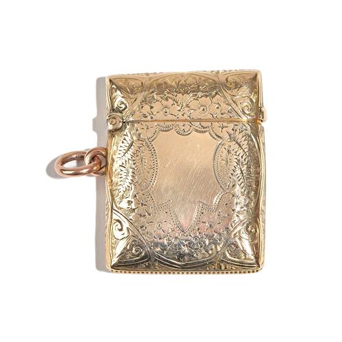 A Victorian 9ct gold rectangular vesta case, with floral and fern spray engraved decoration, Birmingham 1896, gross weight 12.8 gms. Illustrated.