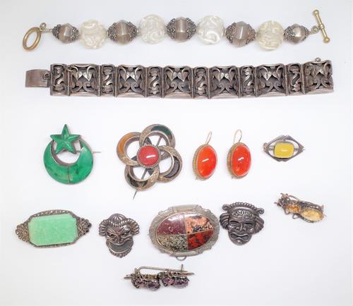 A group of jewellery, comprising; a Mexican panel link bracelet, with pierced decoration, detailed Sterling 925, a bead link bracelet, a malachite bro