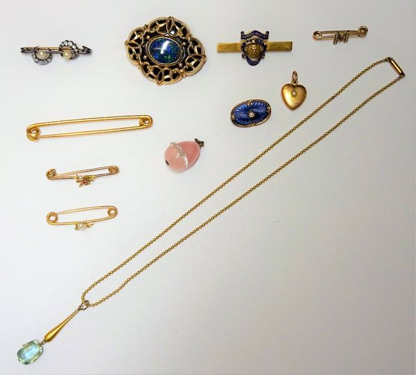 A diamond and cultured pearl bar brooch, designed as twin crescents, five further gold bar brooches and lace pins, a black enamelled and opal set shap