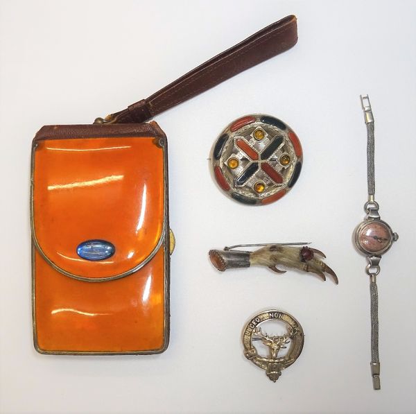 A Victorian silver mounted varicoloured agate and gem set circular brooch, probably Scottish, a claw brooch, a clan brooch, a Baume lady's wristwatch