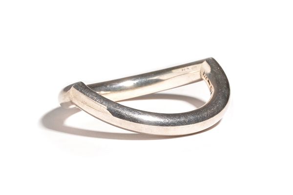 A Georg Jensen silver bangle, of oval abstract form, detailed Georg Jensen 925 S 372, gross weight 60 gms. Illustrated.