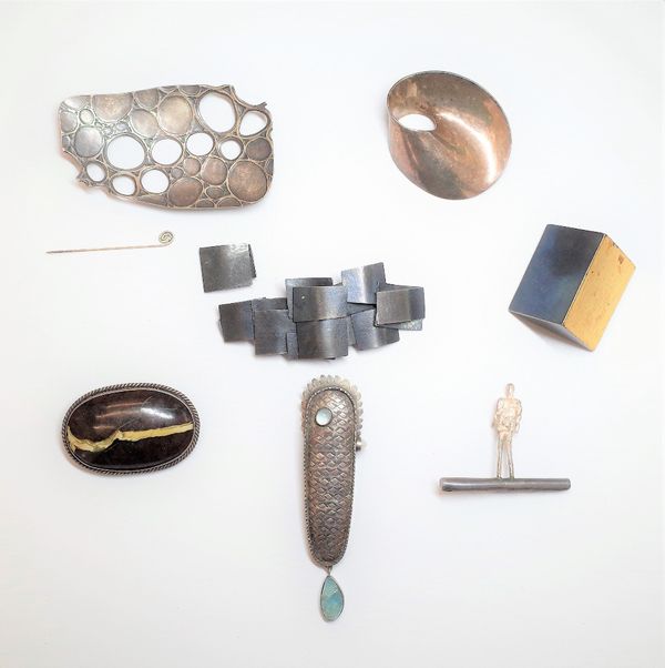 A Zina oval silver brooch, of abstract design, detailed Zina 925, a brooch cast as an abstract figure of a man standing and five further studio brooch