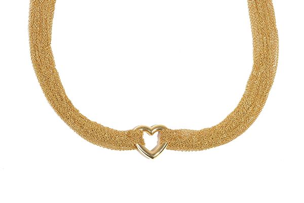 A Tiffany & Co 18ct gold, open heart necklace, the open heart motif suspended from a multi-trace link gold necklace, fastened with a bar and circular