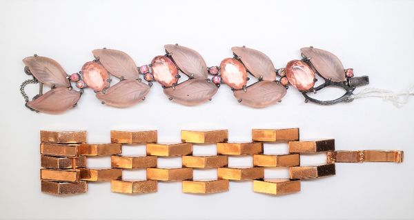 A Schiaparelli coloured paste costume bracelet, circa 1950s/1960s, of foliate design and a gilt metal five row bracelet, of angular design, having a f