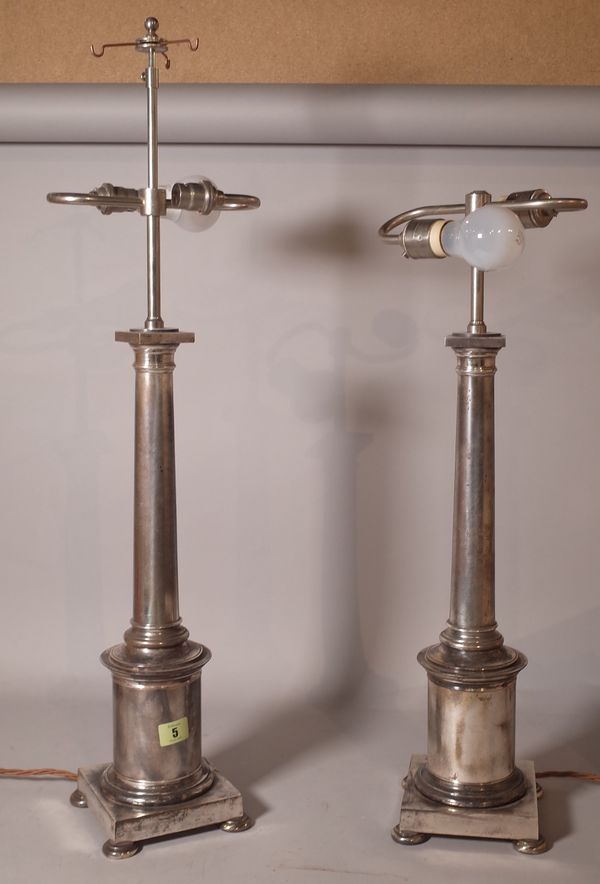 A pair of 20th century chrome table lamps, on tapering column square plinth base, 78cm high, (a.f.), (2).