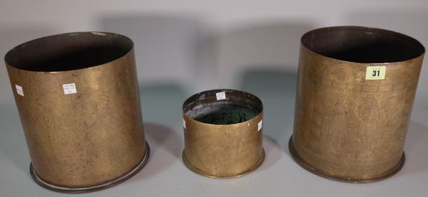 Trench Art; two large German WW I shell cases, one engraved 'The Great War 1914-19', the other with a Dutch couple under an arbour, 23cm high and one