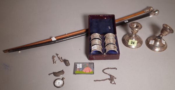 Silver and collectables, including; two swagger sticks, candlesticks, napkin rings and sundry, (qty).