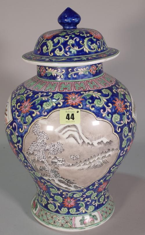 A mid 20th century Chinese vase and cover with character marks to base, 39cm high.