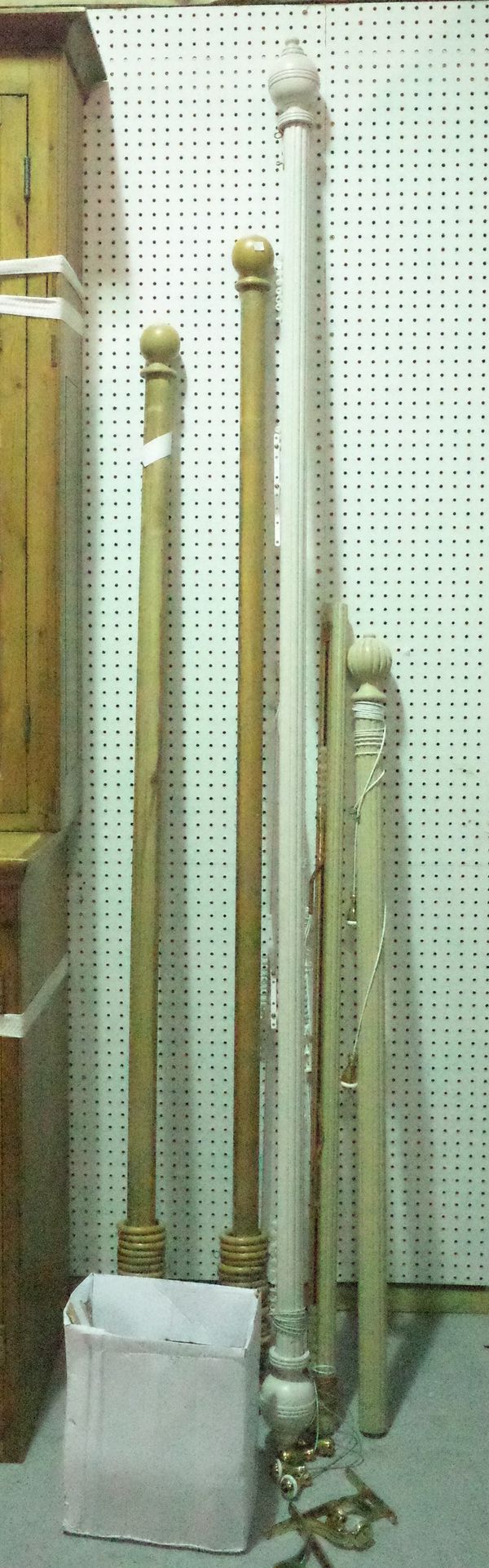 A 20th century pitch pine curtain rail, 210cm long, another smaller 193cm long, a 20th century white painted reeded curtain rail 246cm long and anothe