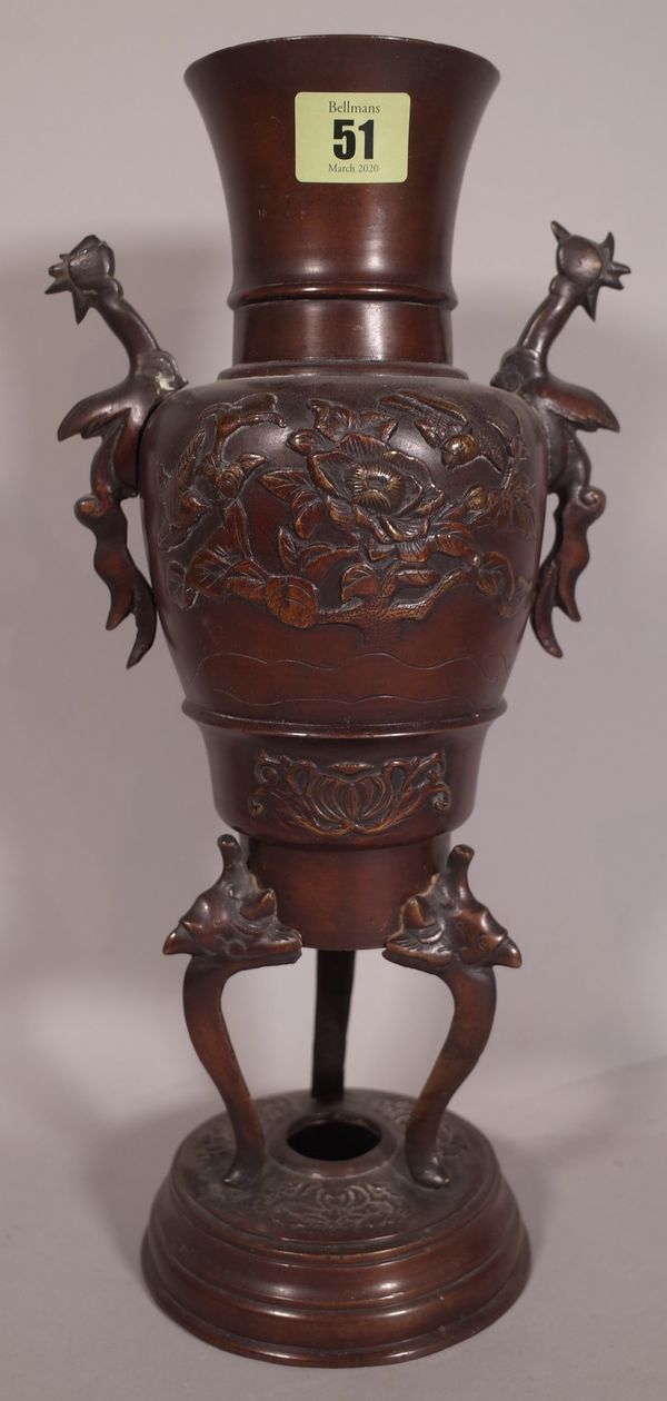 An early 20th century Japanese twin handled bronze vase on circular plinth base, 37cm high.