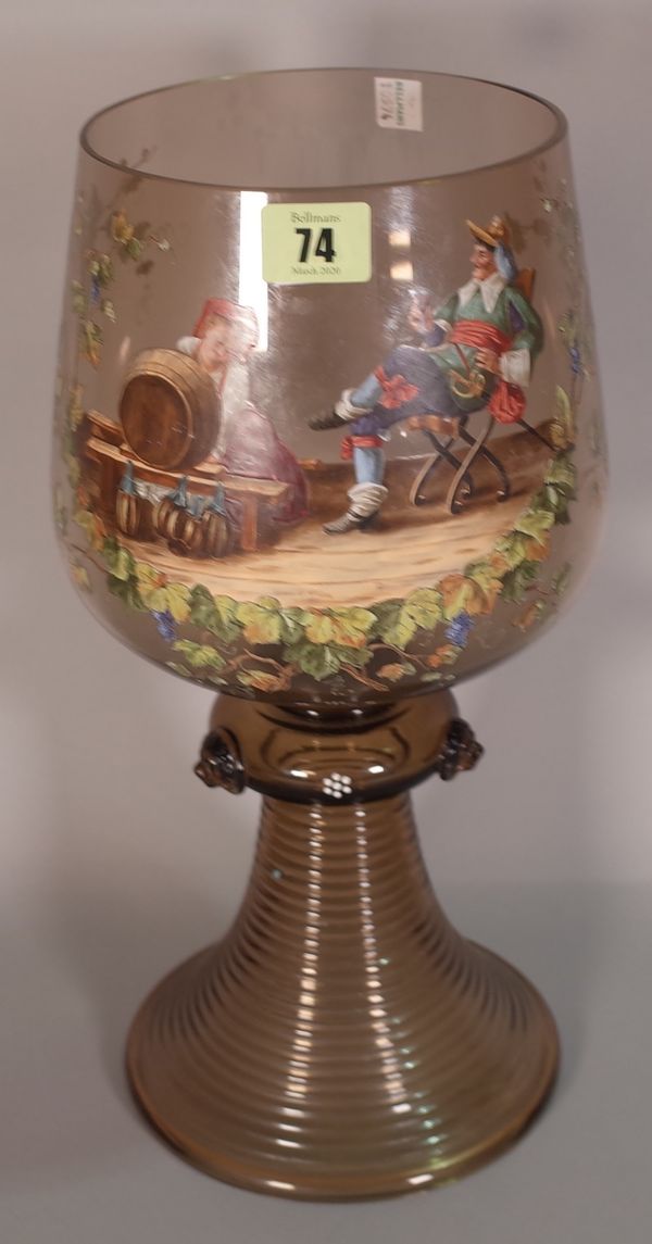 A large German glass rummer, 19th century, painted with a Continental gentleman and companion enjoying wine, 37cm high.