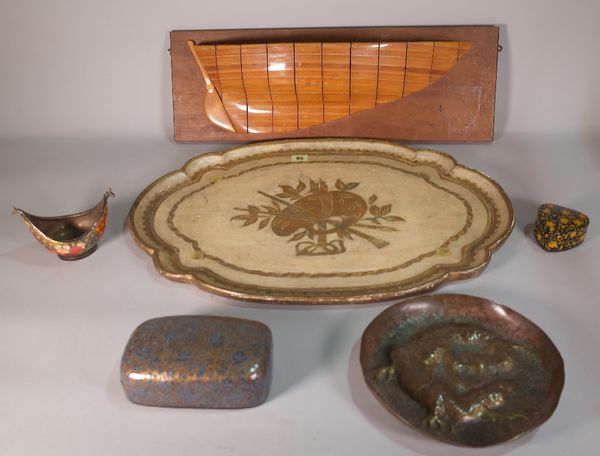 A Victorian style white and parcel gilt decorated oval tray, 64cm wide, a group of three 20th century lacquer boxes, an early 20th century embossed co