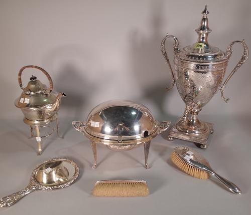 Silver and silver plated wares, including; an early 20th century twin handled urn, 52cm high, a tea pot on stand, 35cm high, a silver plated domed bre