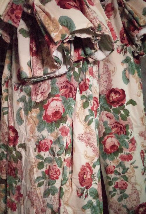 Curtains, two pairs of lined and interlined rose floral curtains, the larger pair 140cm wide x 202cm long, the other 100cm wide x 200cm long.