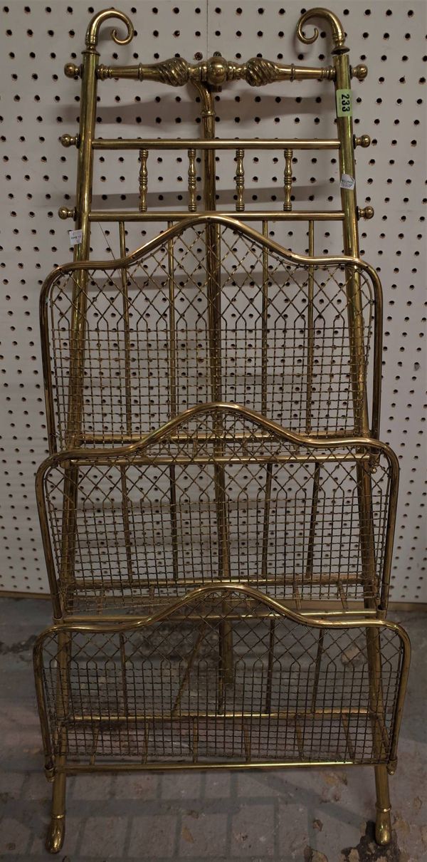 A 19th century brass folding three section Canterbury with easel style support, 115cm high.