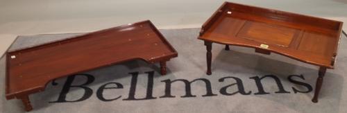 An early 20th century mahogany galleried tray table, 59cm wide x 28cm high and another similar, 79cm wdie x 15cm high, (2).