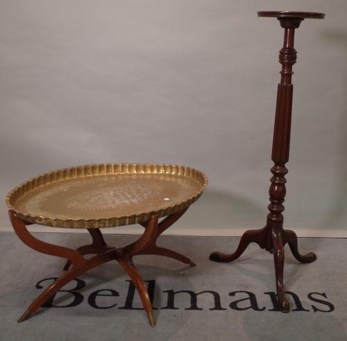 A Regency mahogany jardiniere stand on reeded column and downswept supports, 28cm diameter x 120cm high, and an early 20th century brass oval coffee t
