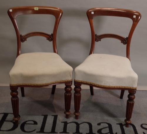 A pair of William IV mahogany bar back dining chairs, 47cm wide x 85cm high, a late George III mahogany open armchair, 54cm wide x 101cm high, and a E