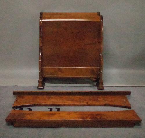 A pair of 20th century stained beech child's single sleigh beds each with removable crib bar sides, 80cm wide x 95cm high, (2).