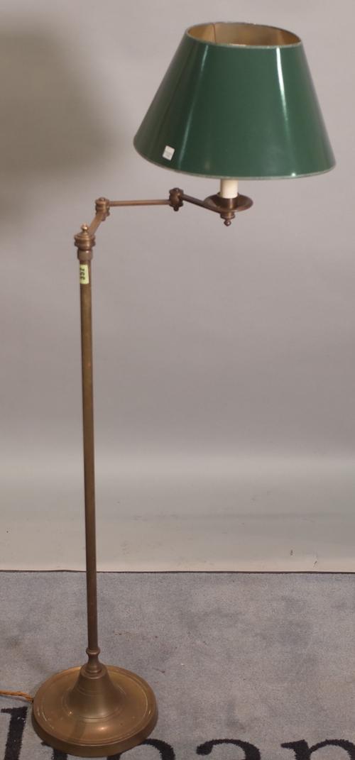 An early 20th century brass angle poise adjustable standard lamp, 127cm high.