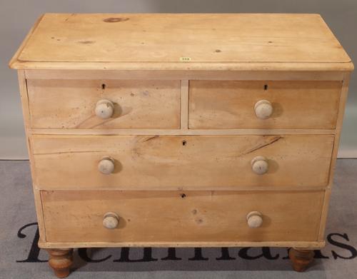An early 20th century pine chest of two short and two long drawers, 97cm wide x 82cm high.