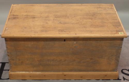 An early 20th century pine trunk, 96cm wide x 47cm high, and another similar smaller, 81cm wide x 51cm high, (2).