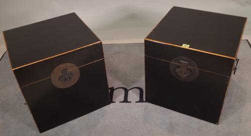 A pair of 20th century black lacquer lift top boxes, 45cm wide x 46cm high, (2).